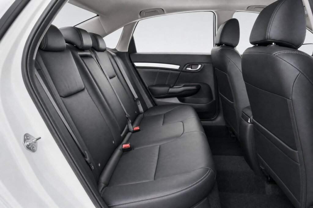 Rear passenger seats of the Honda Civic, showing the legroom and upholstery