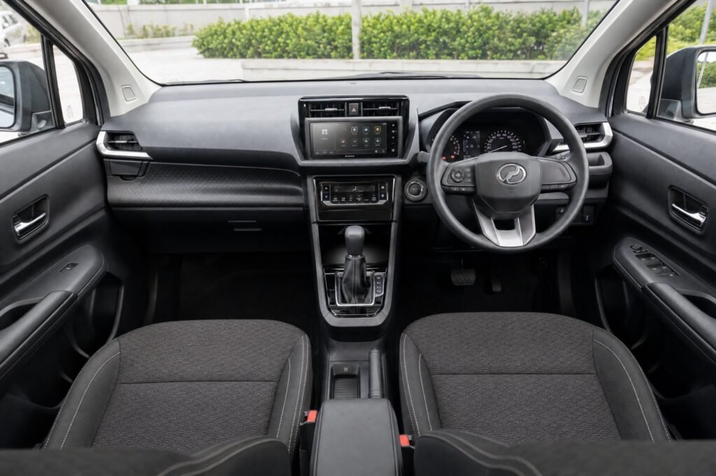 Front cabin of the Perodua Alza (Facelift), showing the dashboard, steering wheel and front seats