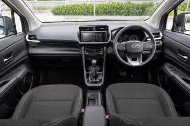 Front cabin of the Perodua Alza (Facelift), showing the dashboard, steering wheel and front seats