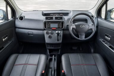 Front cabin of the Perodua Alza (SE), showing the dashboard, steering wheel and front seats
