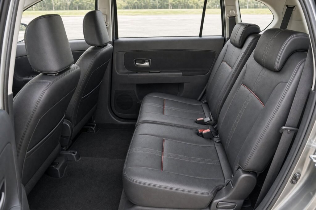 Rear passenger seats of the Perodua Alza (SE), showing the legroom and upholstery