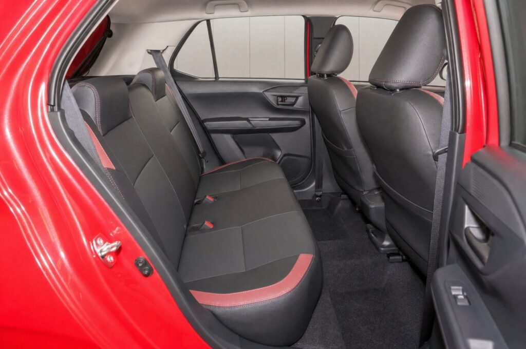 Rear passenger seats of the Perodua Axia (Facelift), showing the legroom and upholstery