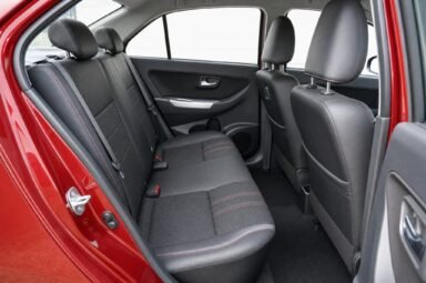 Rear passenger seats of the Perodua Bezza, showing the legroom and upholstery