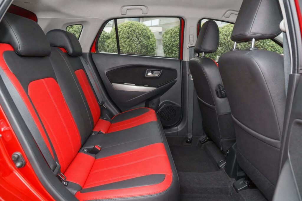 Rear passenger seats of the Perodua Myvi, showing the legroom and upholstery