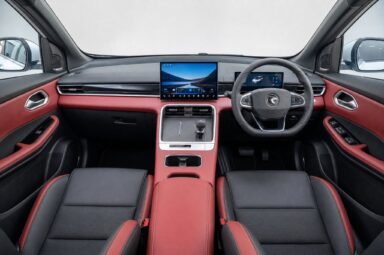 Front cabin of the Proton X50, showing the dashboard, steering wheel and front seats