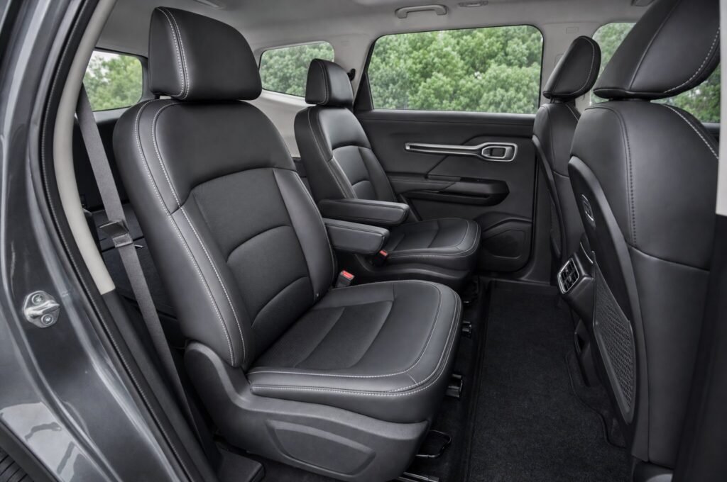 Rear passenger seats of the Proton X90, showing the legroom and upholstery