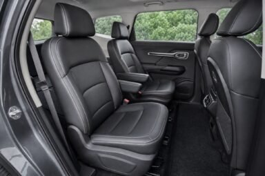 Rear passenger seats of the Proton X90, showing the legroom and upholstery
