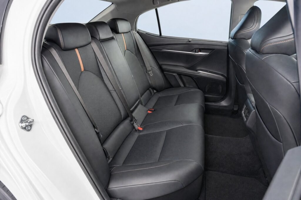 Rear passenger seats of the Toyota Camry, showing the legroom and upholstery