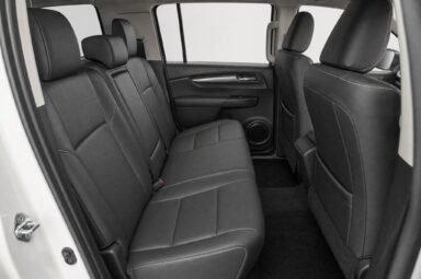 Rear passenger seats of the Toyota Hilux, showing the legroom and upholstery